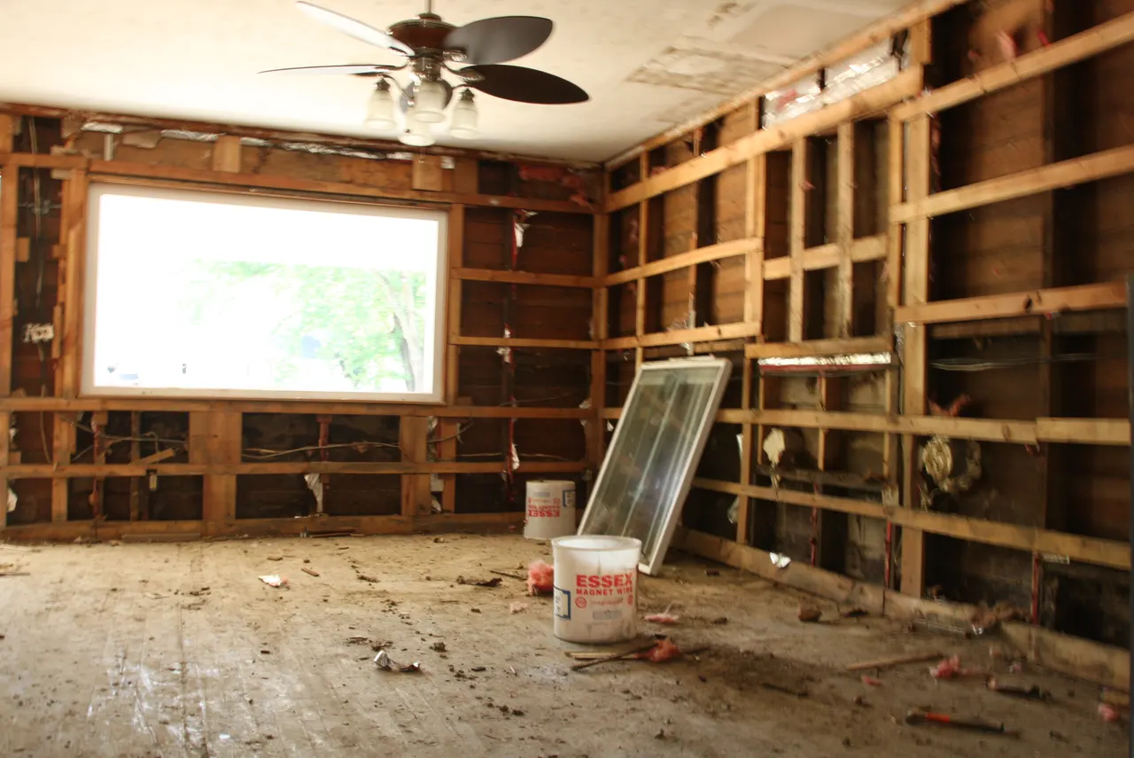 Exposed interior framing illustrates material-removal decisions